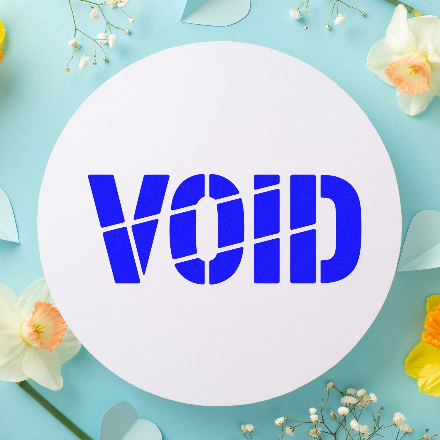 White circular security seal sticker with bold blue VOID text on pastel blue background, framed by spring flowers.