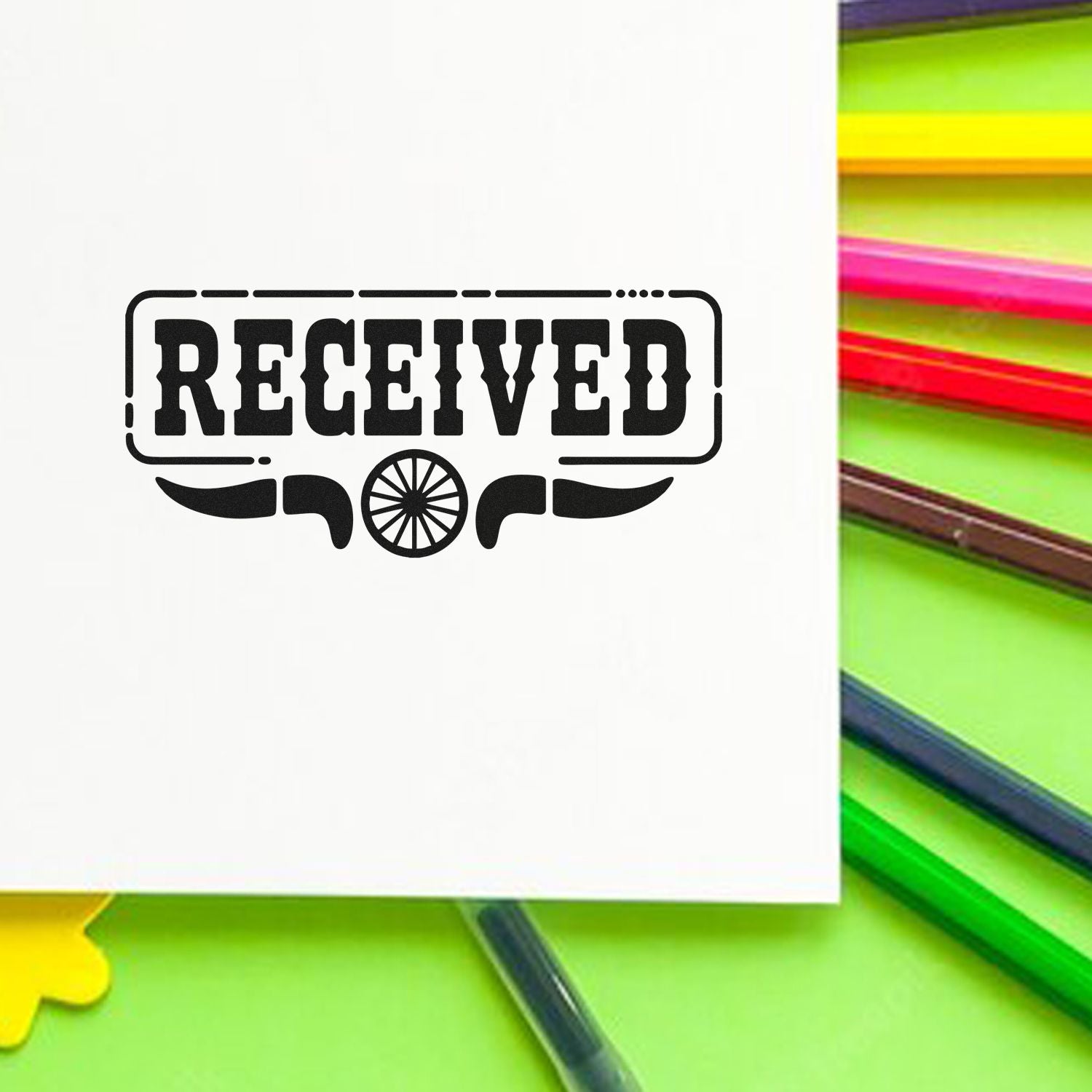 Black RECEIVED stamp seal graphic on white paper, with neon green, pink, yellow, and red pens in the background.