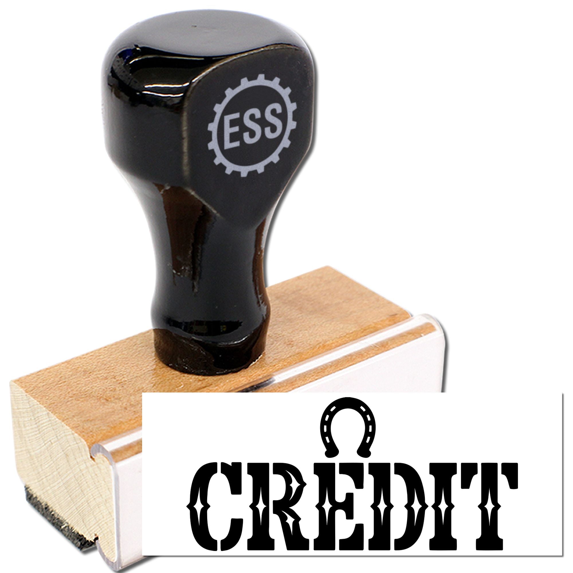 Black rubber stamp and seal on a wooden block, with ESS logo and bold black CREDIT imprint.
