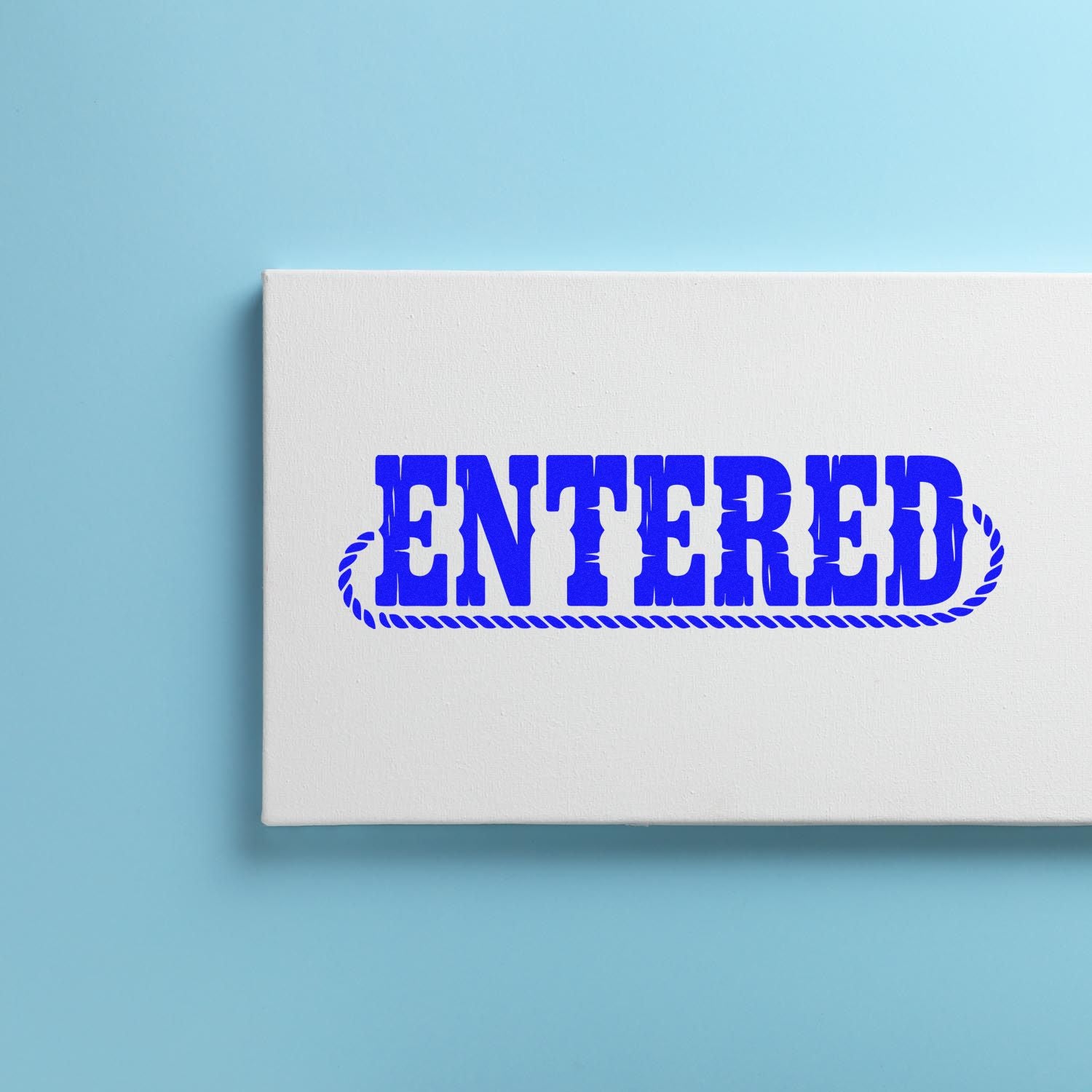 White stamp and seal product box with bold blue ENTERED seal imprint on a light blue background