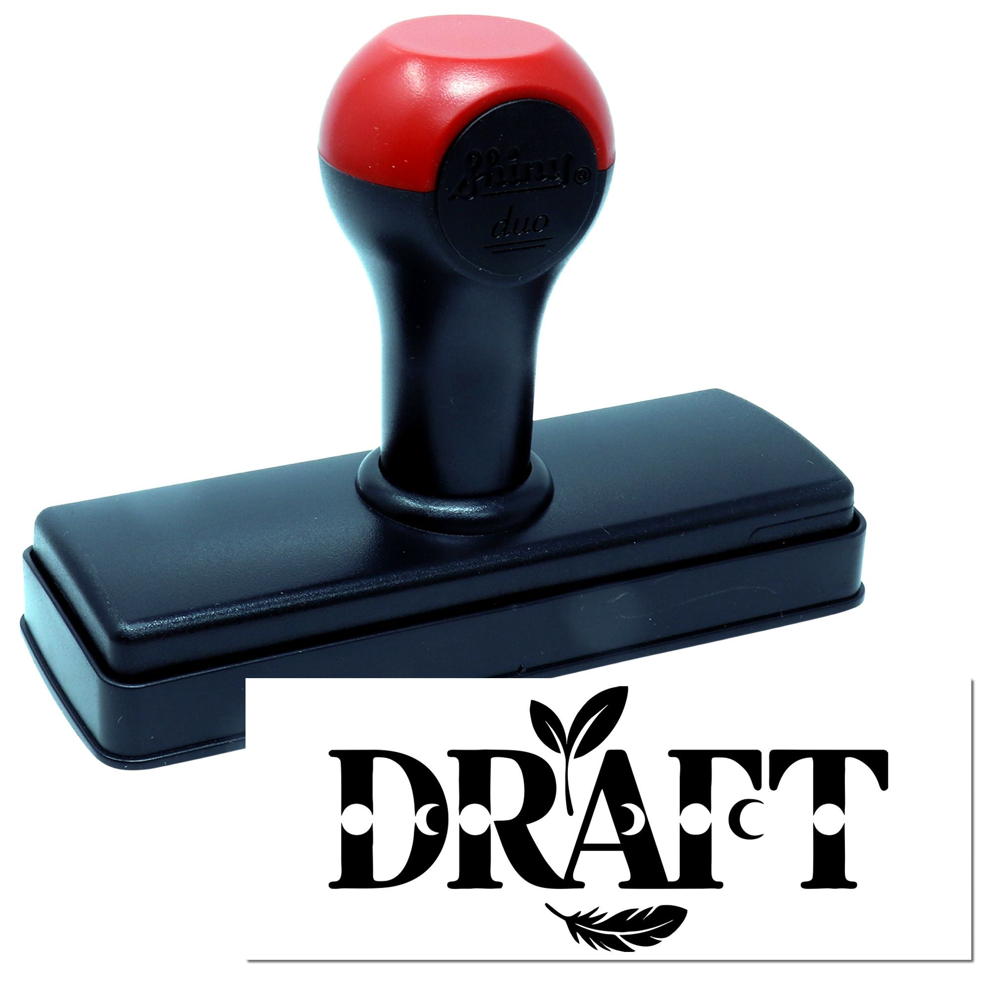 Red and black self-inking rubber stamp with black base, showing a bold DRAFT seal impression.