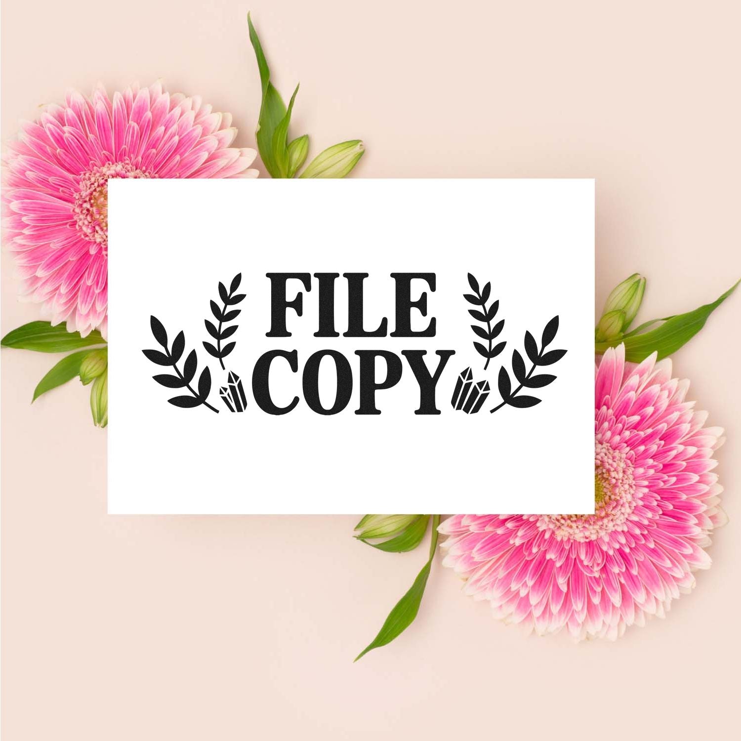 Black FILE COPY stamp with leaf accents on white, surrounded by pink gerbera flowers and green leaves on a blush background.
