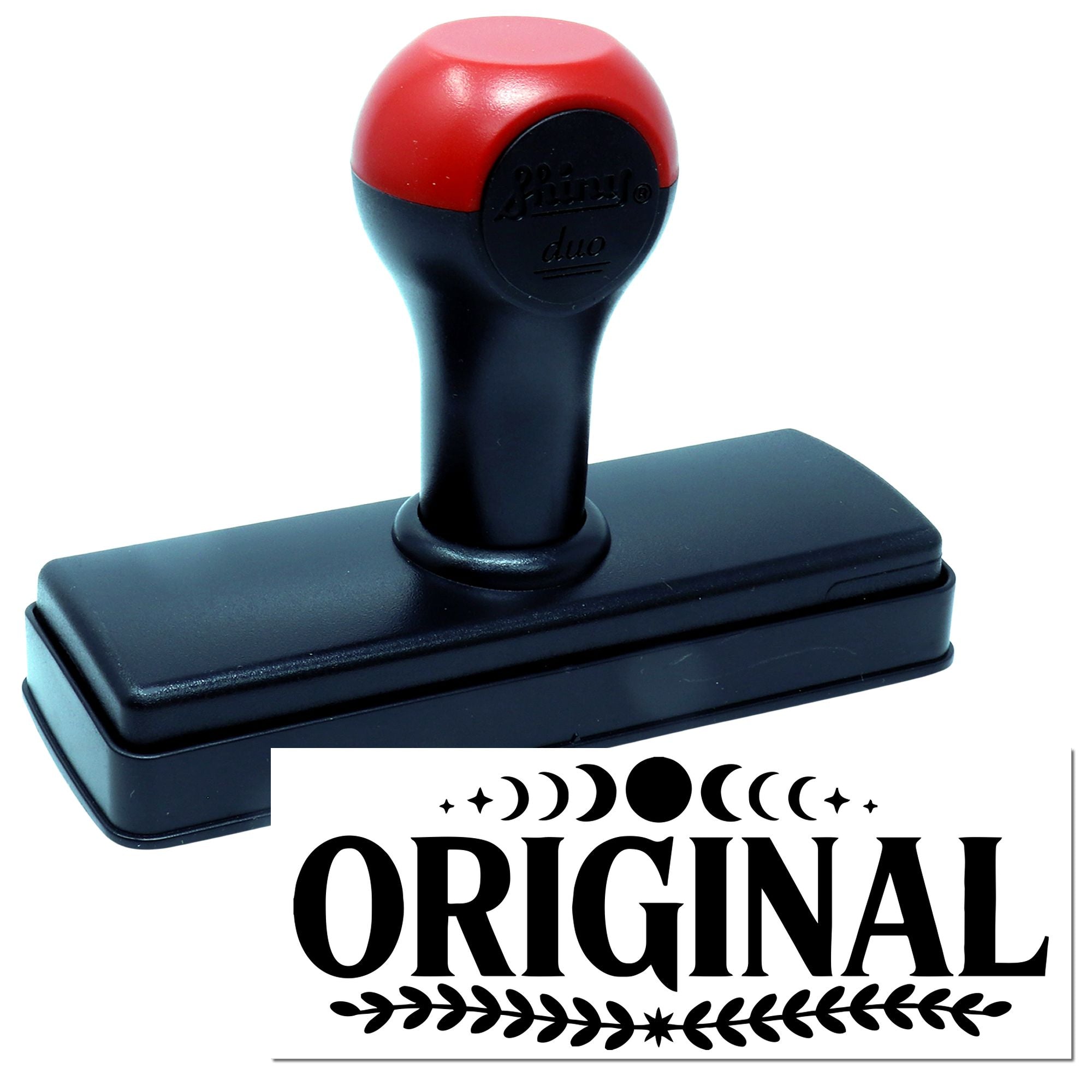 Red and black self-inking stamp with rectangular black base and bold ORIGINAL seal impression.