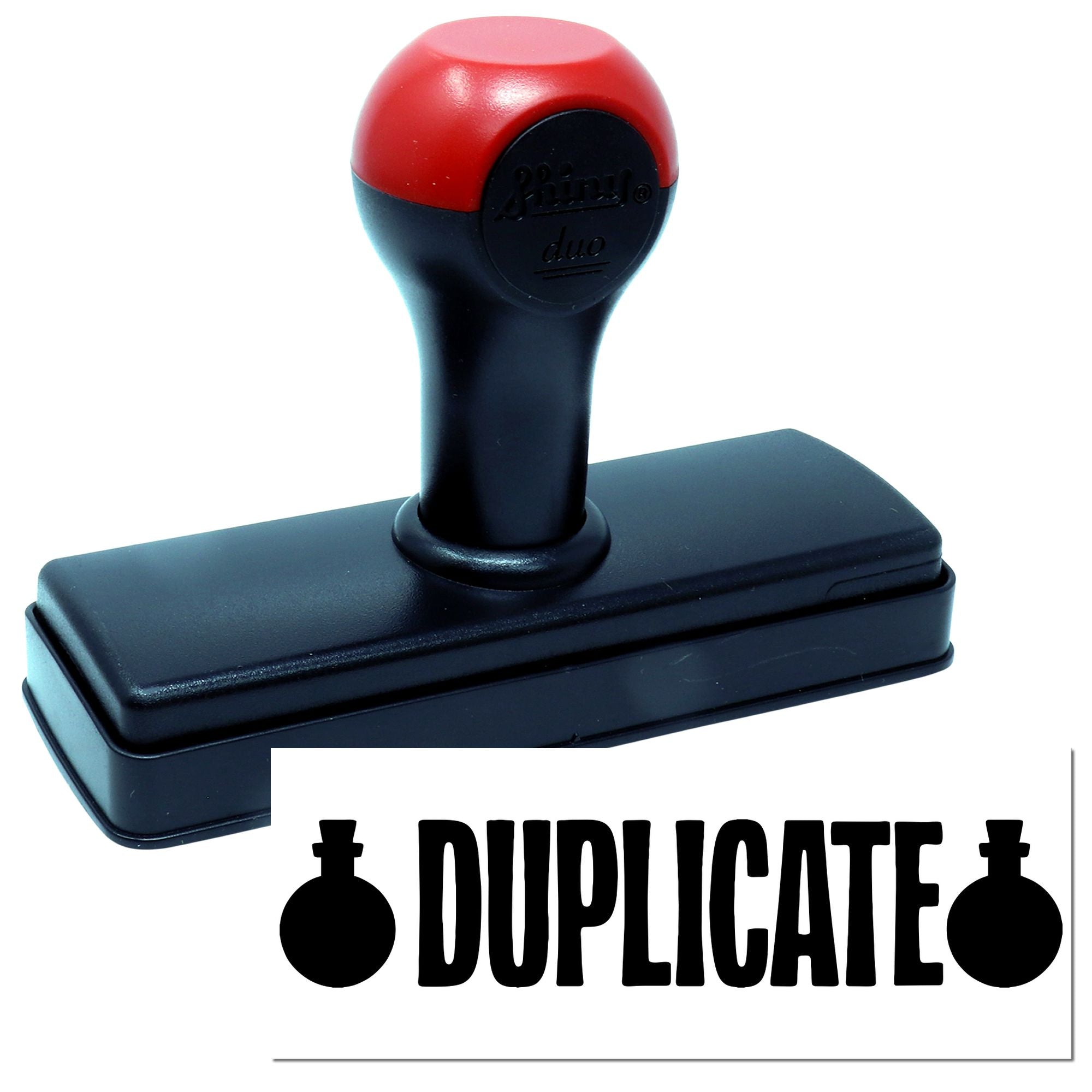 Red and black self-inking rubber stamp seal with DUPLICATE label, mounted on a rectangular base.