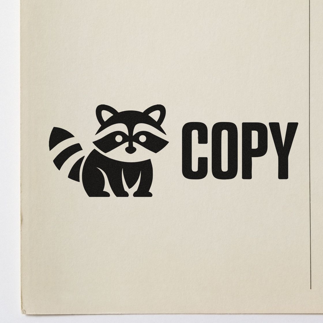 Black raccoon logo stamp seal with bold COPY text on cream paper