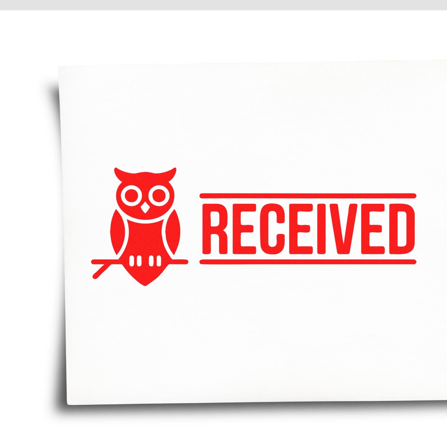 Red RECEIVED stamp with owl icon in bold red on white paper, an office seal for stamped documents.
