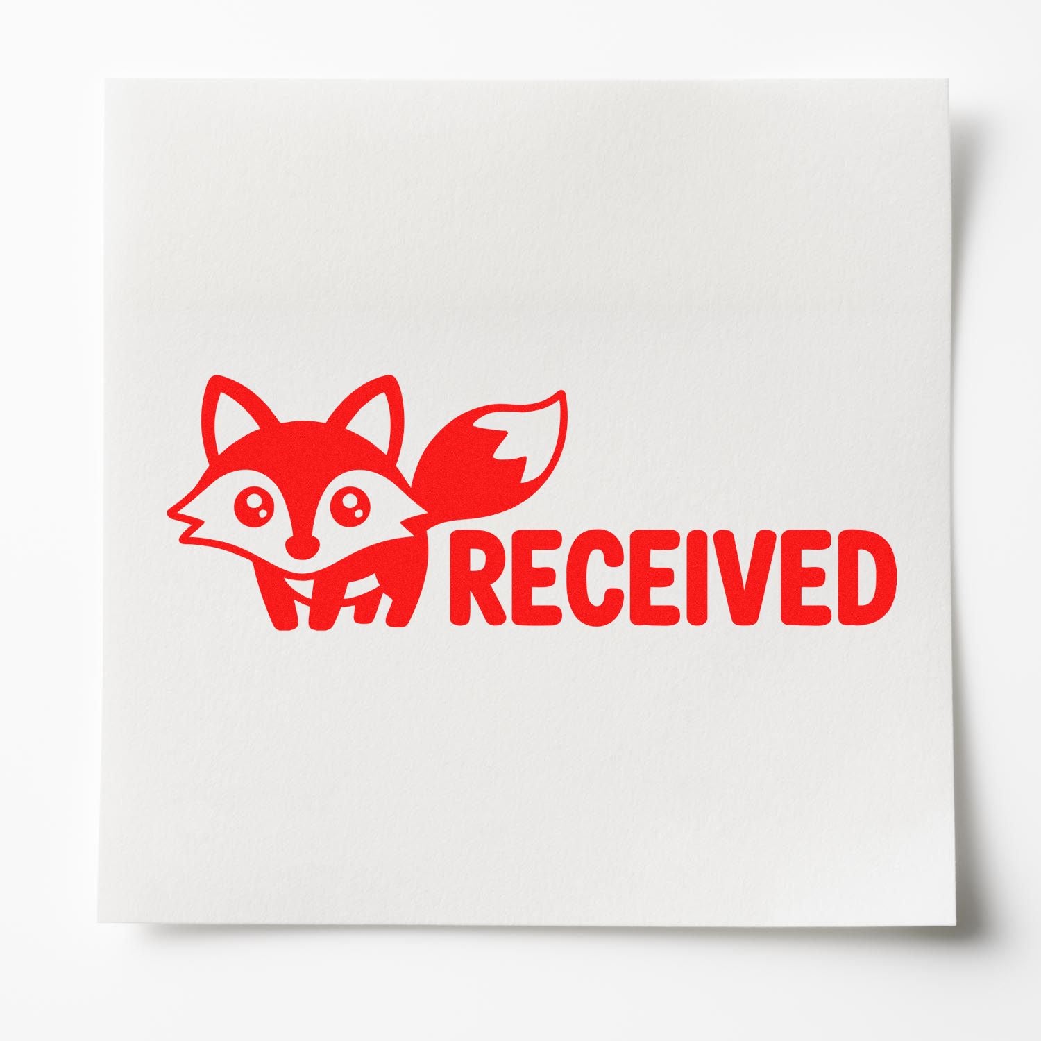 Bright red fox RECEIVED stamp seal on white textured paper