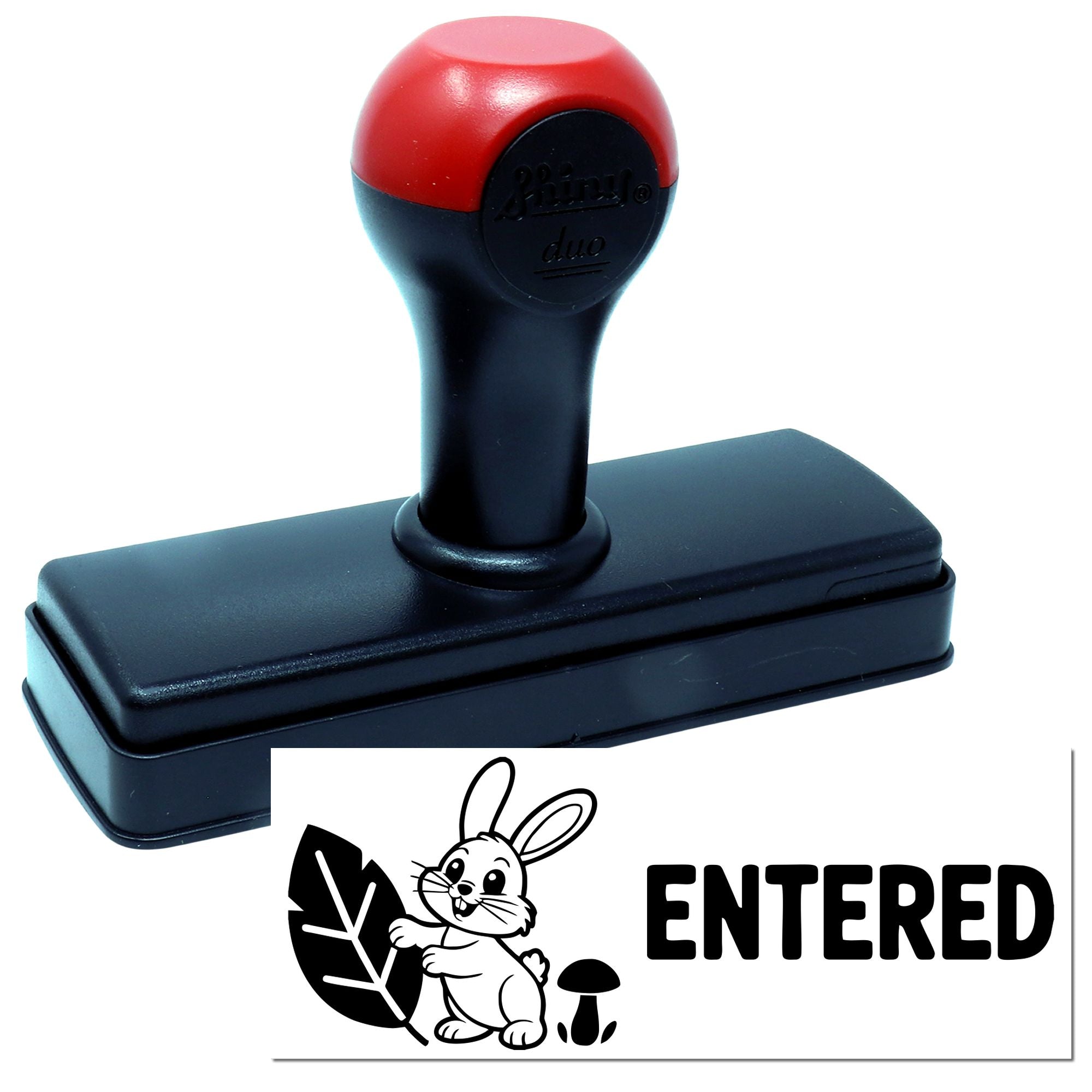 Red and black self-inking stamp with bunny and ENTERED seal imprint