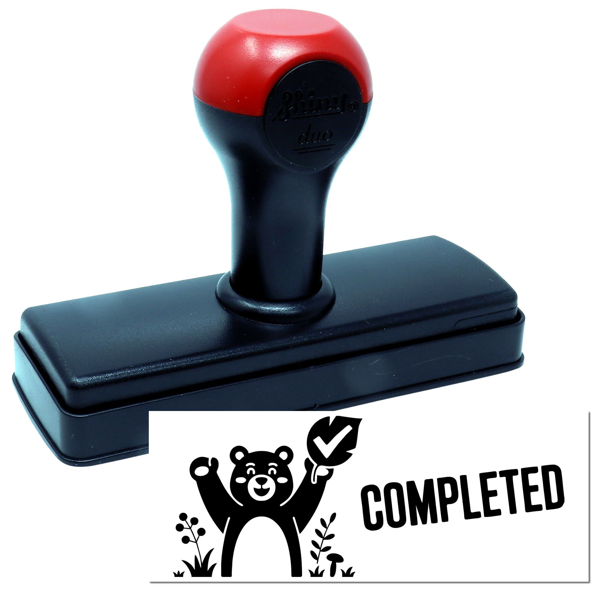 Red and black self-inking stamp and seal with a COMPLETED bear graphic on a white background.
