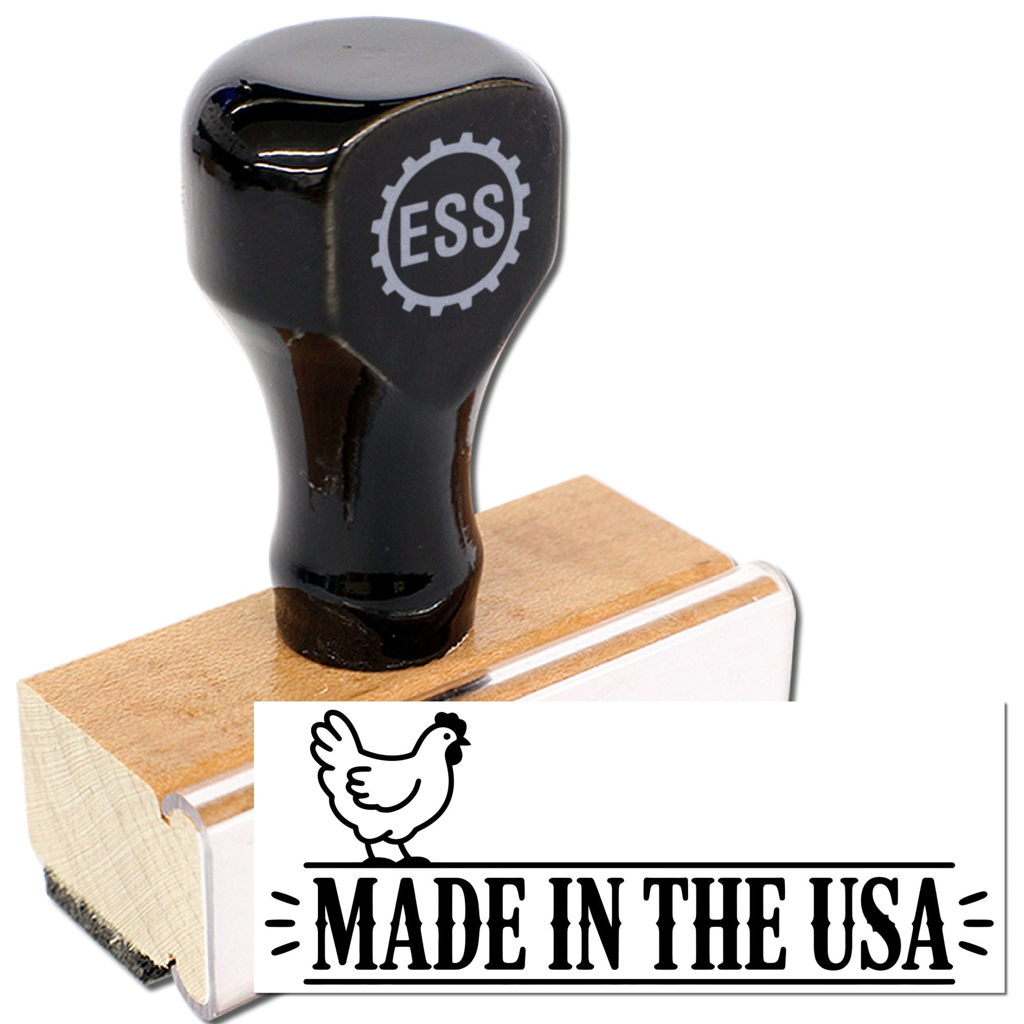 Black rubber stamp seal on wood block with white Made in the USA chicken design.