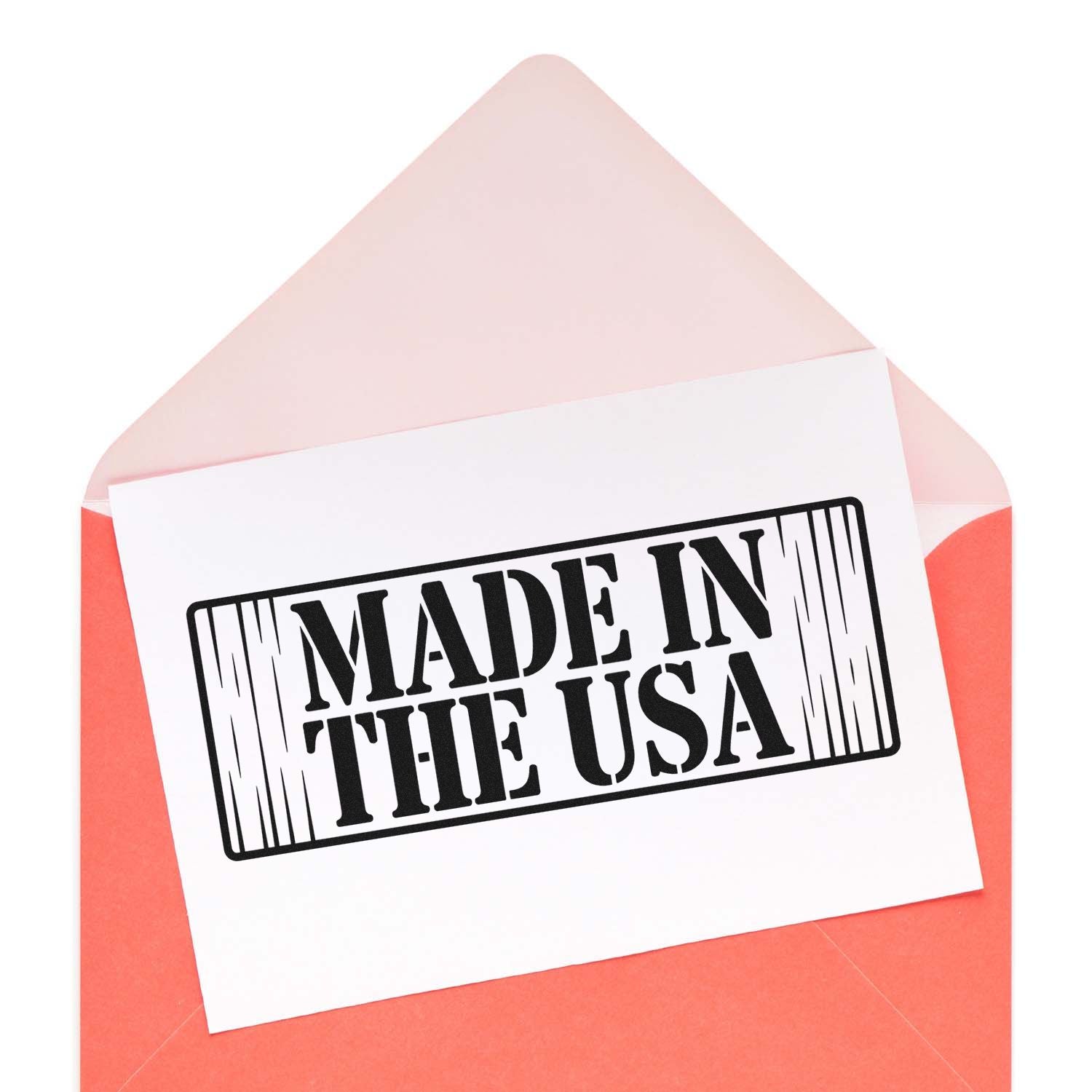 Coral envelope with white card and black MADE IN THE USA stamp-style seal logo
