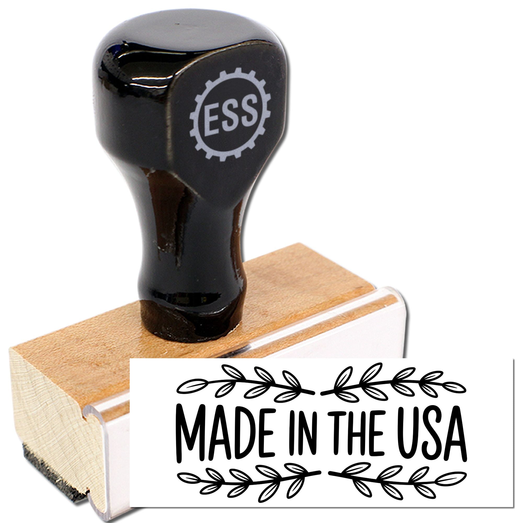 Black rubber stamp on wooden block with ESS logo and Made in the USA seal design.