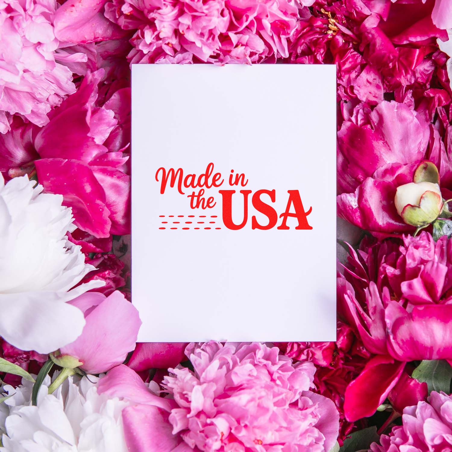 White card with red Made in the USA stamp seal, surrounded by pink and white flowers.