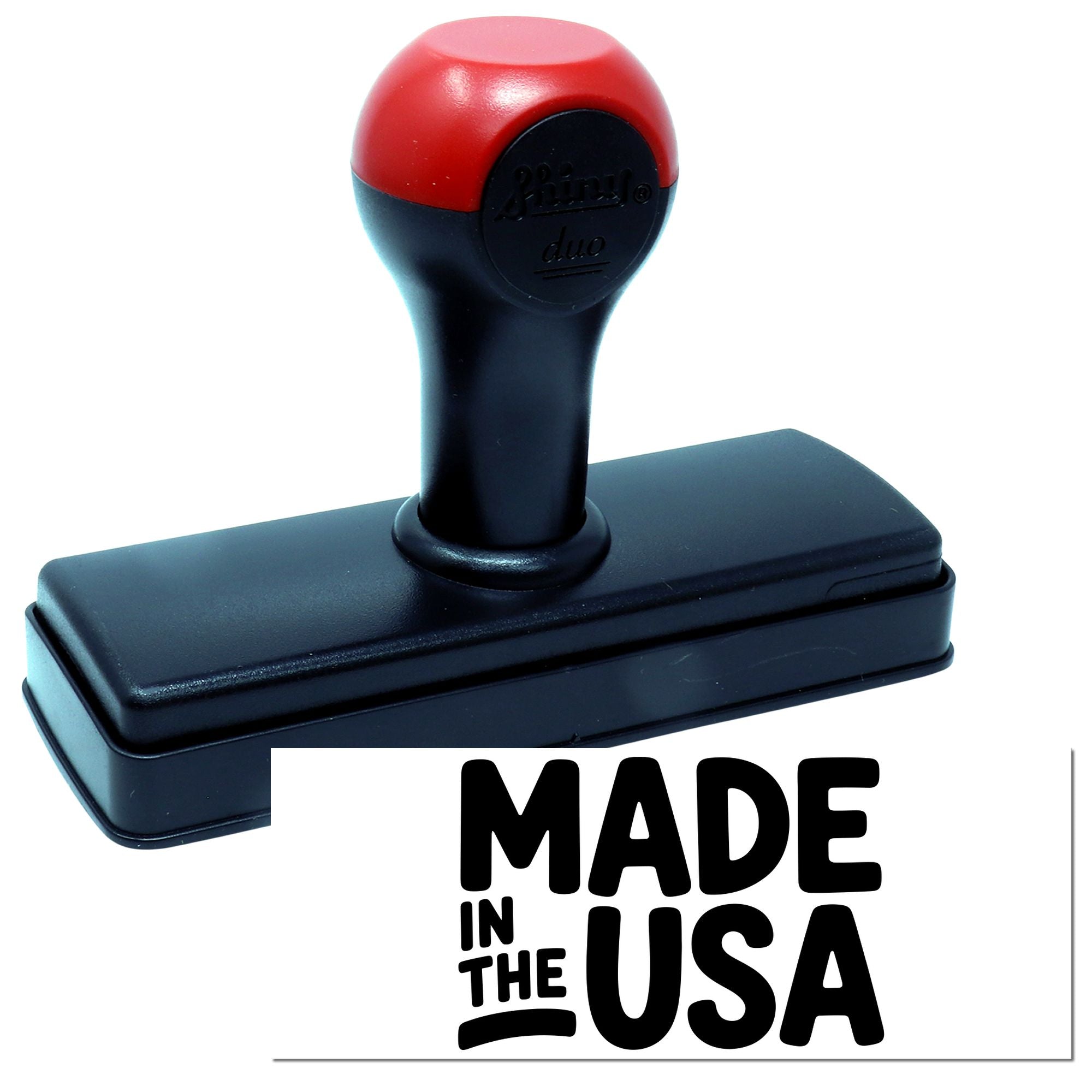Red and black self-inking stamp with rectangular black base and Made in the USA seal text.
