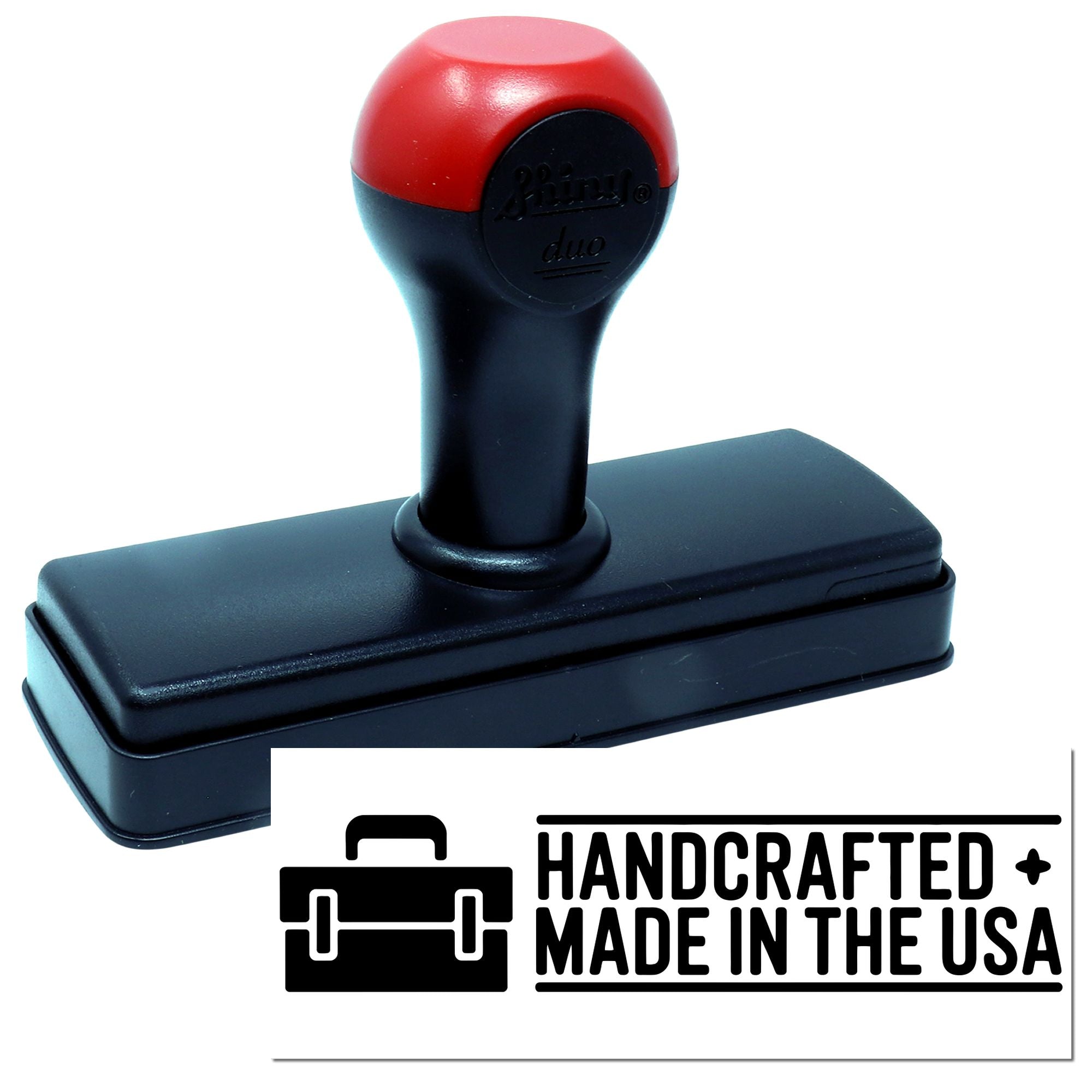 Red and black self-inking stamp with Handcrafted Made in the USA seal graphic and briefcase icon.