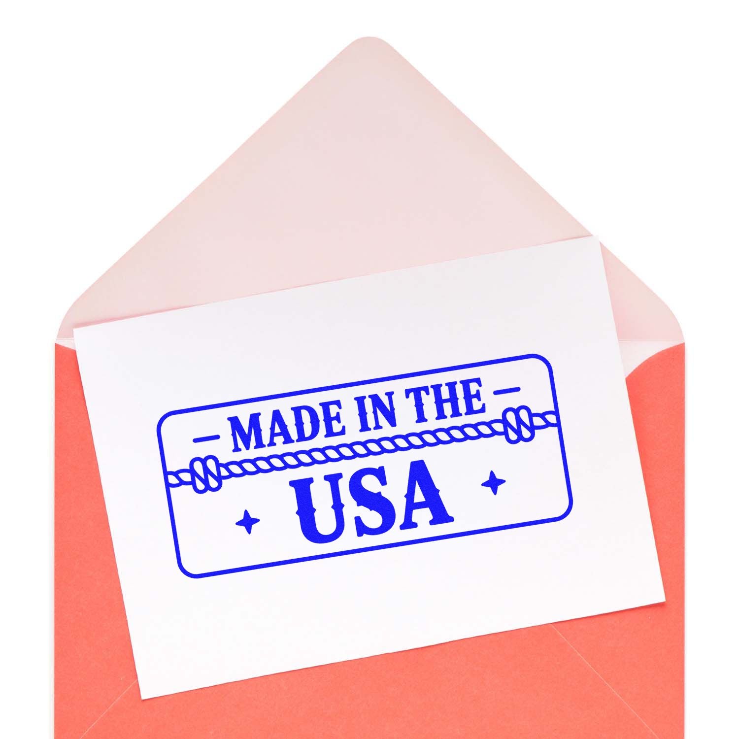 Coral envelope with white card and blue Made in the USA stamp seal, rope border, and stars.