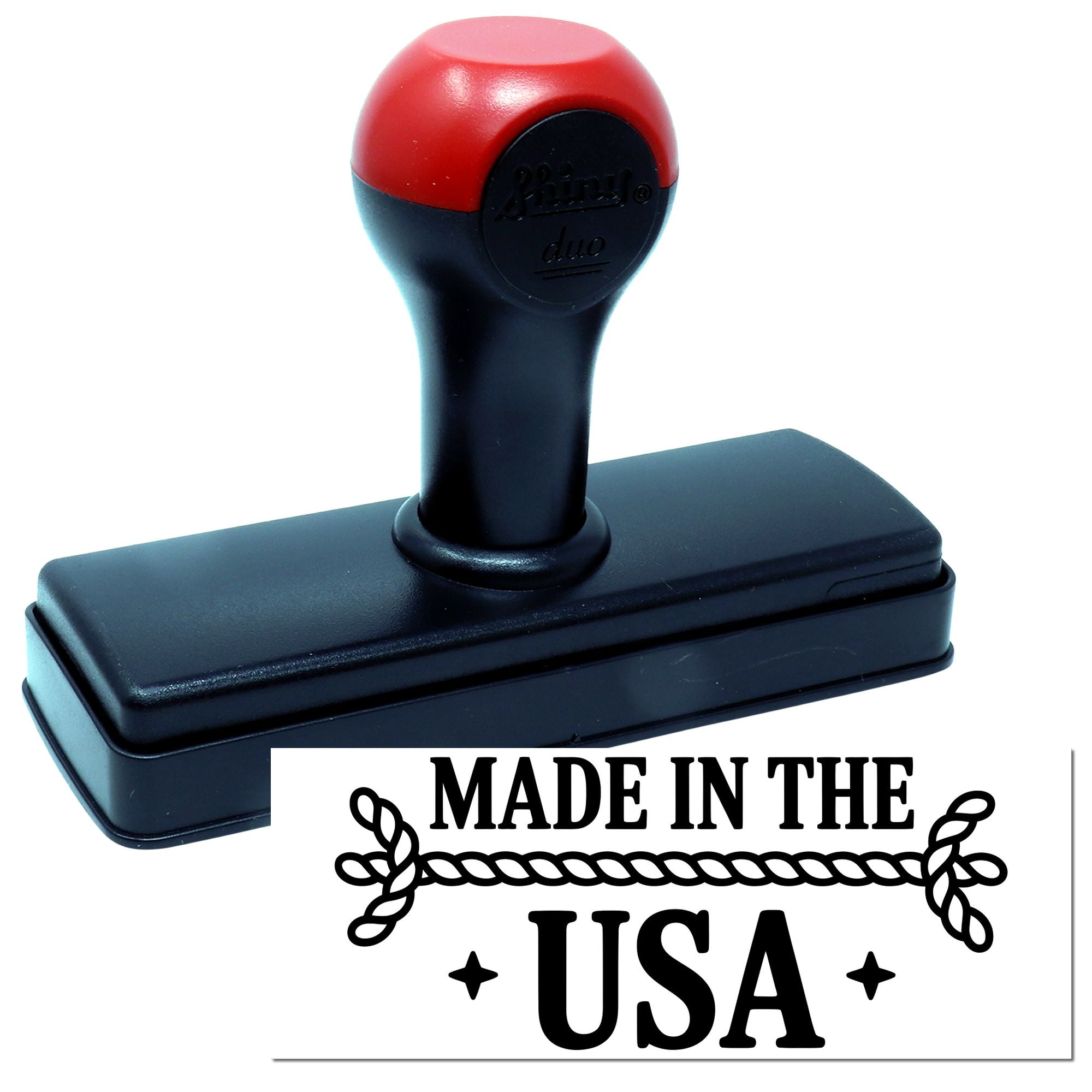 Red and black self-inking stamp with rectangular base and Made in the USA seal.