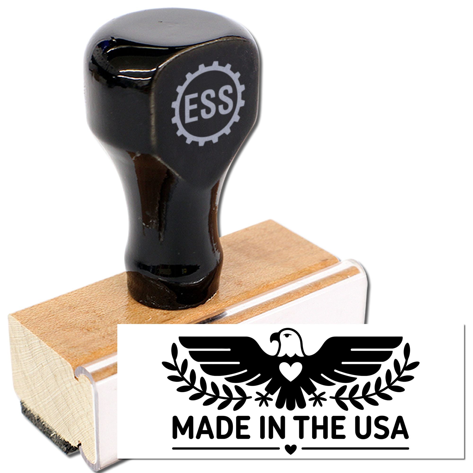 Black ESS rubber stamp with wooden base and white Made in the USA seal featuring an eagle and heart.