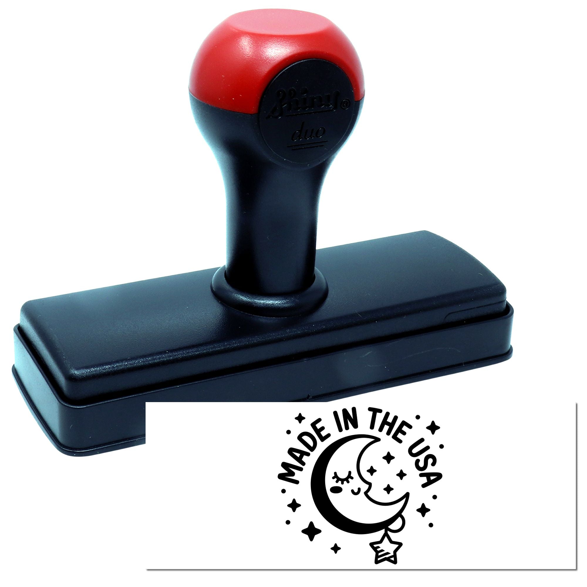 Red and black self-inking stamp with matching seal imprint featuring a Made in the USA moon design.
