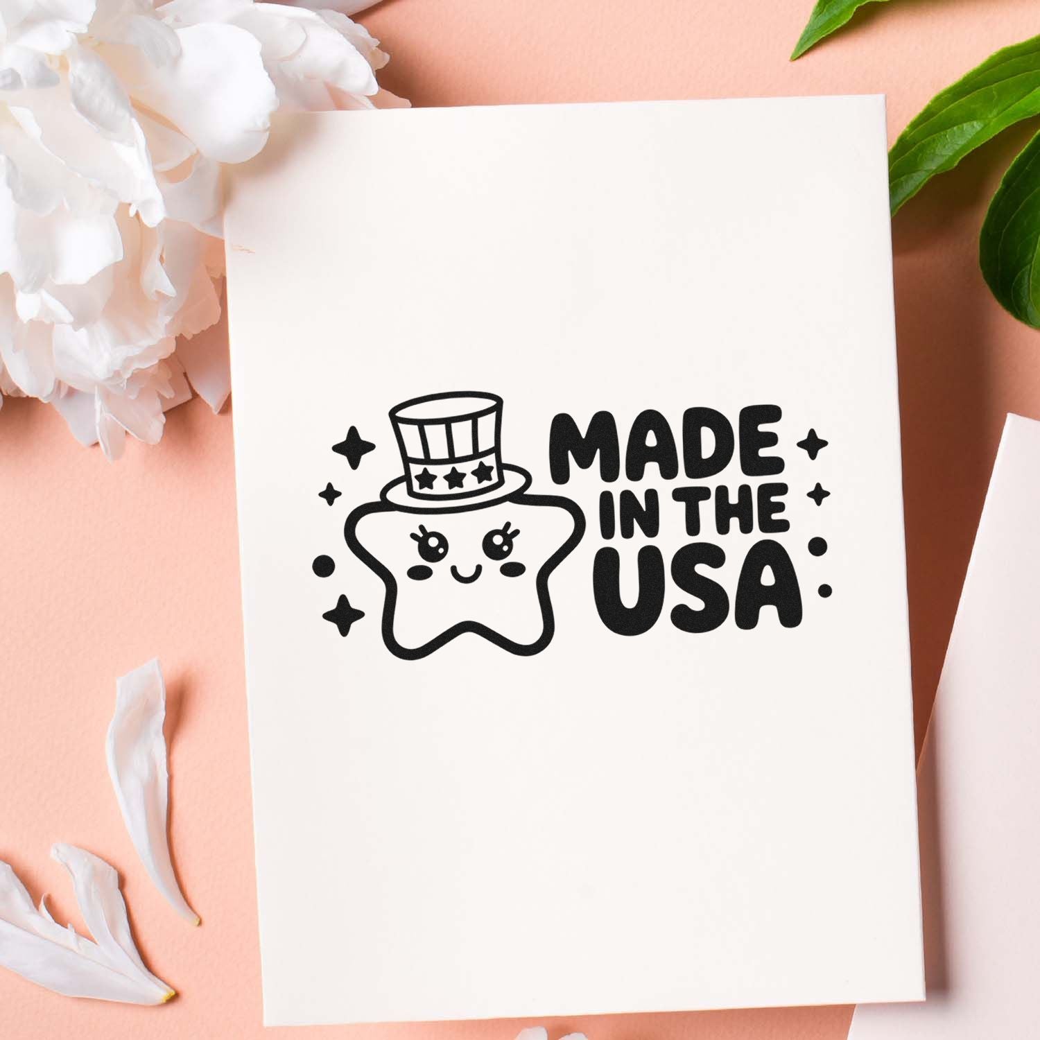 Made in the USA stamp and seal product featuring a cute star character with top hat, bold black lettering, and patriotic craft packaging.