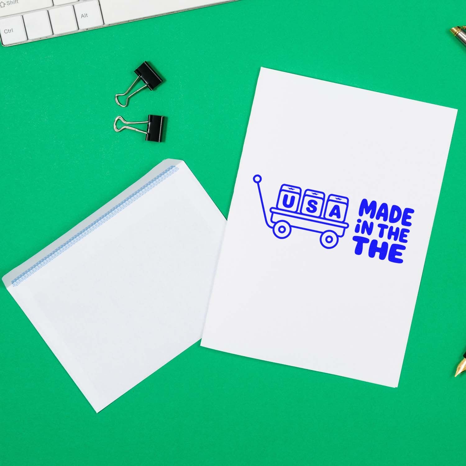 Blue USA-made stamp and seal products on white envelopes with binder clips over a bright green background.