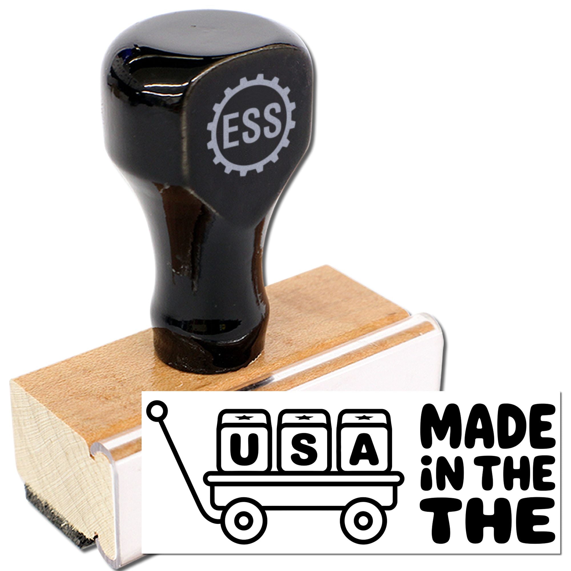 Black ESS rubber stamp on wooden block with white Made in the USA seal