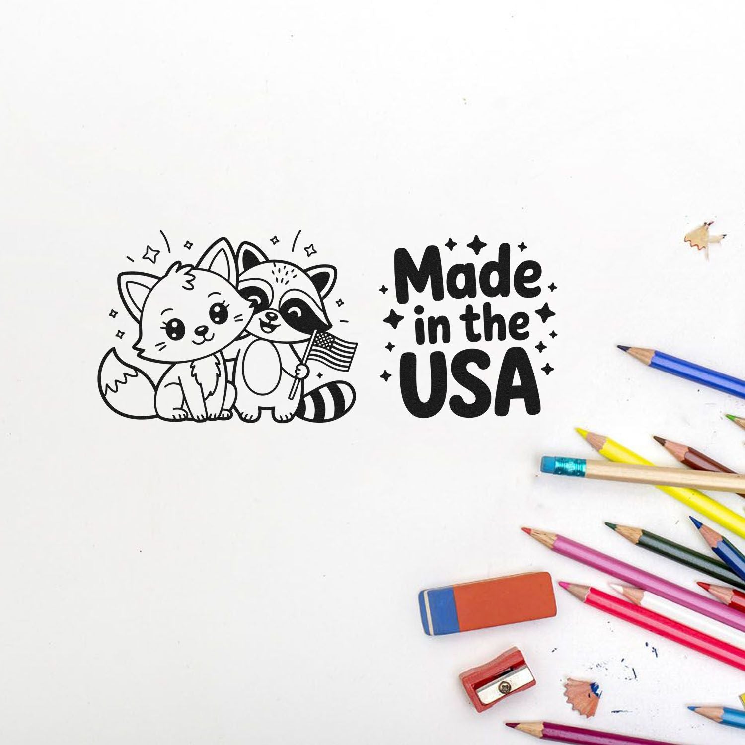 Black stamp design with fox and raccoon holding a U.S. flag beside Made in the USA, on white with colorful pencils and erasers.
