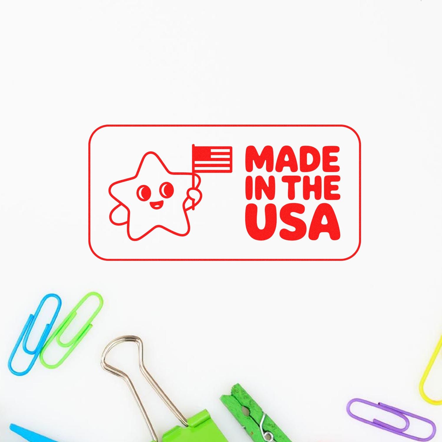 Red Made in the USA stamp seal with smiling star holding flag, white background and colorful paper clips.