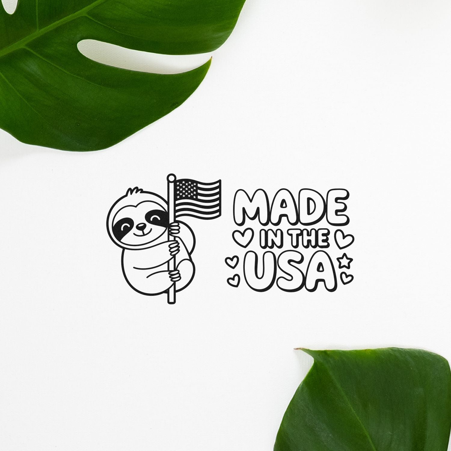Black sloth stamp and seal design with USA flag and Made in the USA text on white, framed by green leaves.