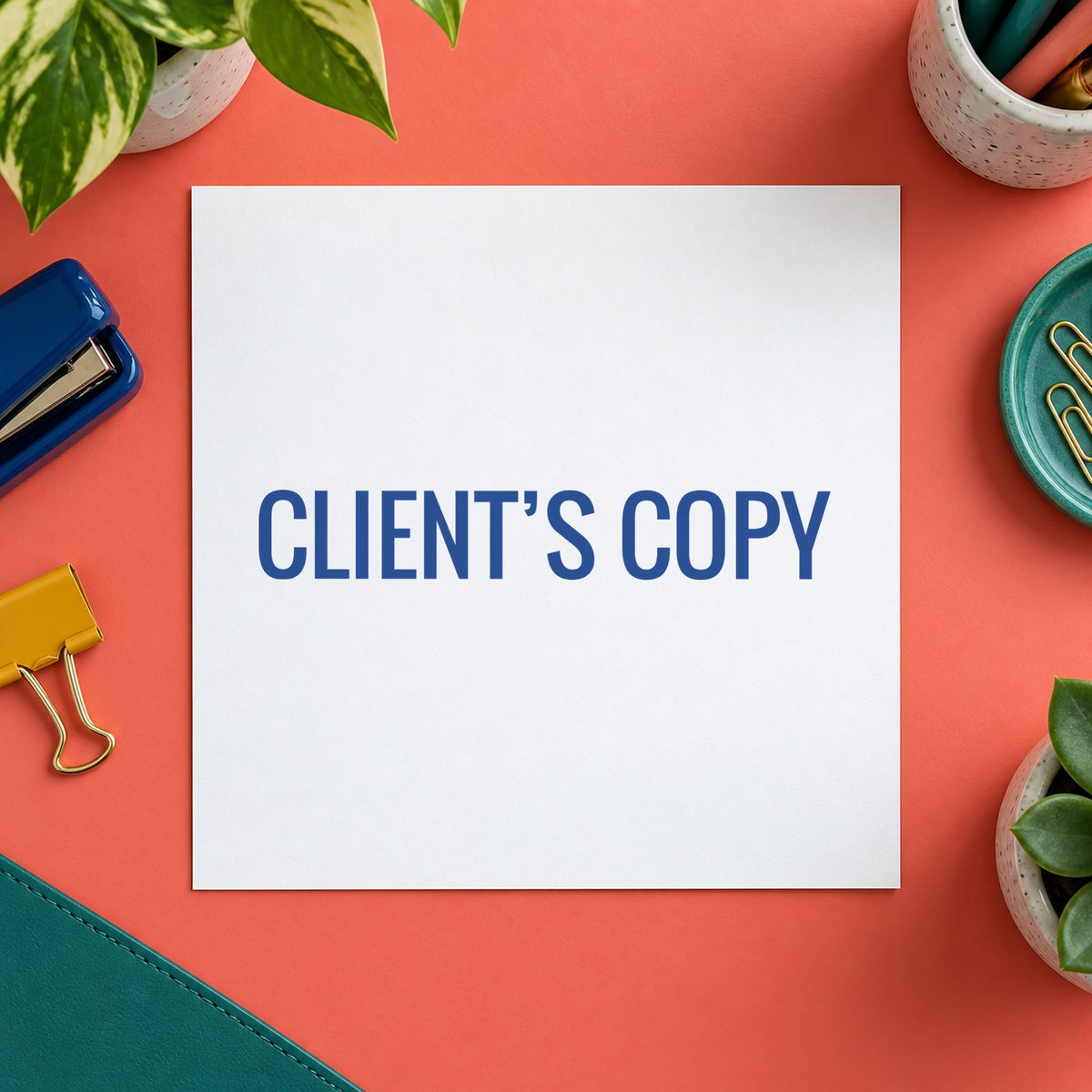 Pre-inked "Client's copy" stamp marking paperwork in an office setting