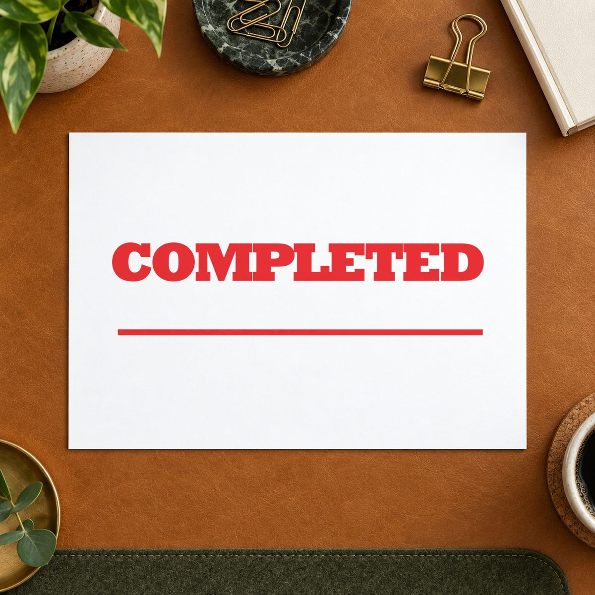 Pre-inked "Completed" stamp marking paperwork in an office setting