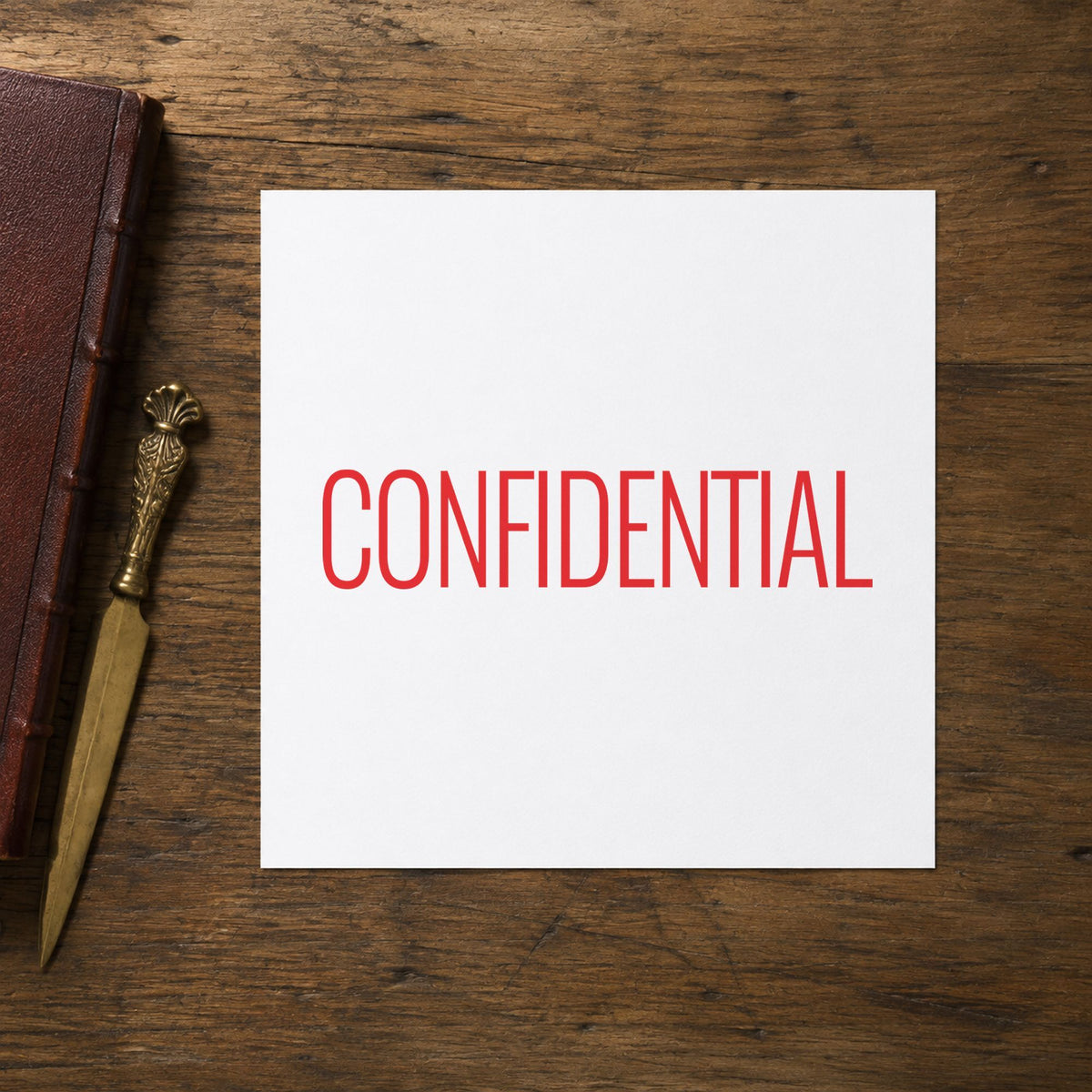 "Confidential" Xstamper stamp at work on everyday office paperwork