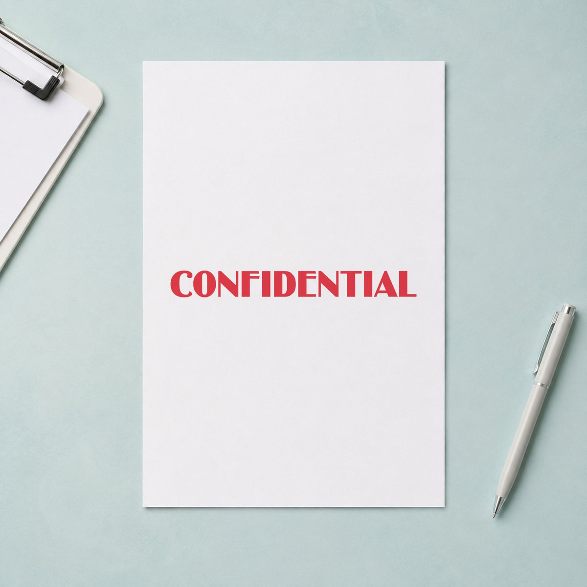 "Confidential" Xstamper stamp at work on everyday office paperwork