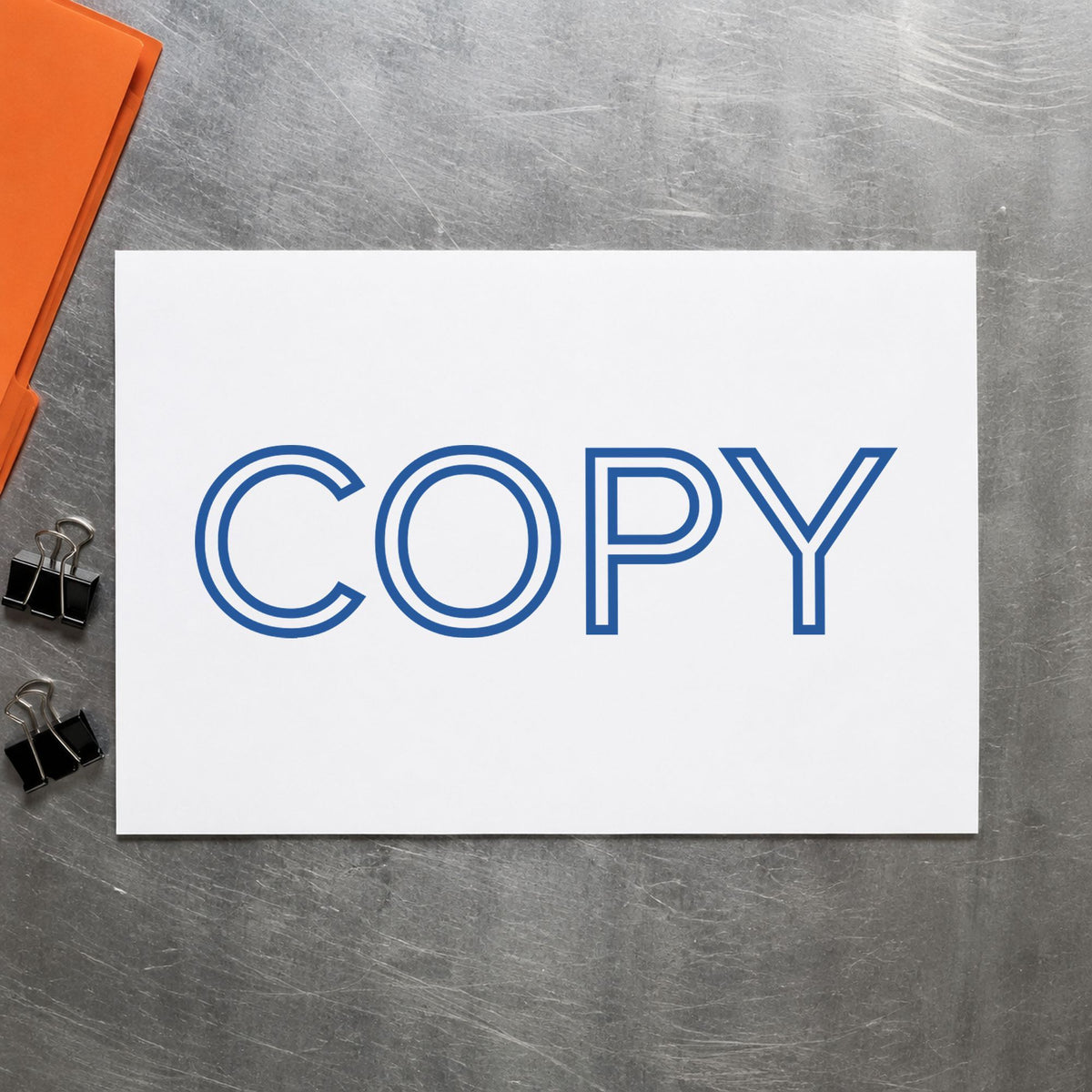 "Copy" Xstamper pre-inked stamp beside its rectangle imprint