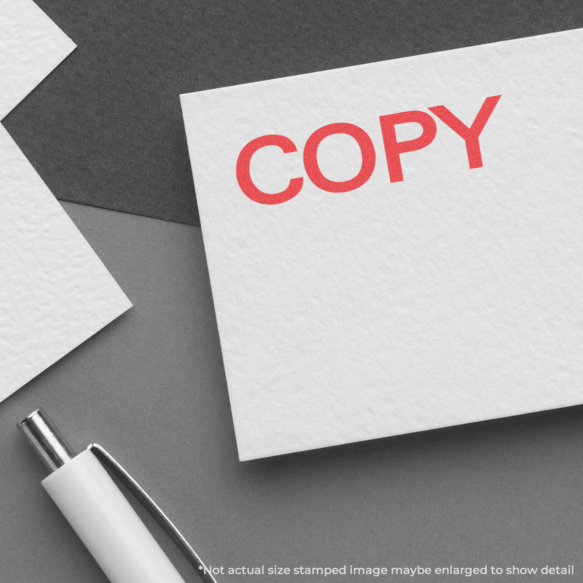 "Copy" pre-inked imprint on a page, rectangle shape at 1/2 x 1-5/8 in