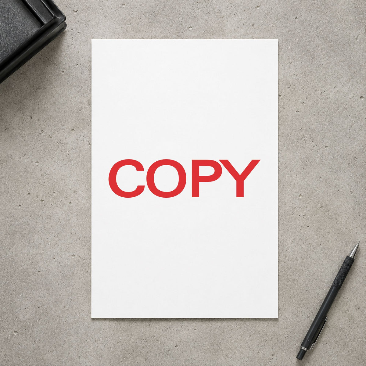 "Copy" stamp pressed on paper, no separate ink pad needed
