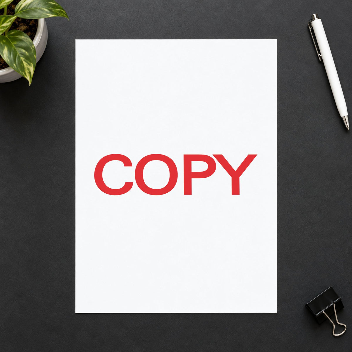 "Copy" Xstamper pre-inked stamp beside its rectangle imprint