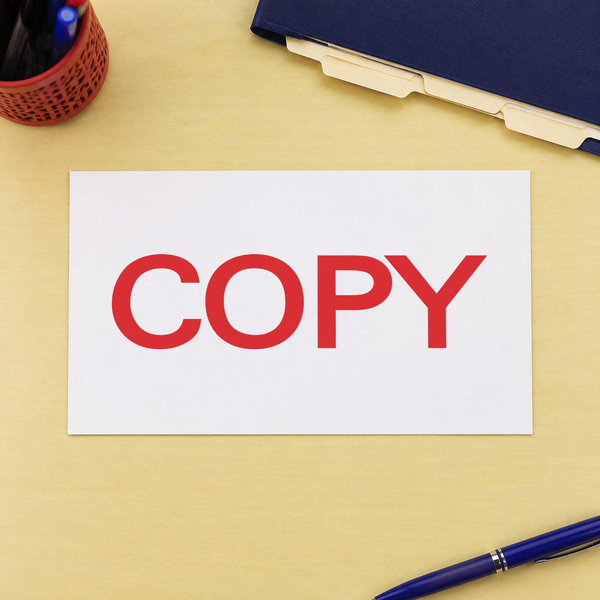 Pre-inked "Copy" stamp marking paperwork in an office setting