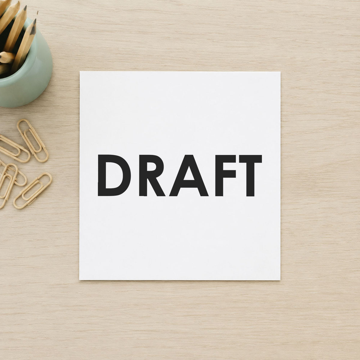 "Draft" stamp pressed on paper, no separate ink pad needed
