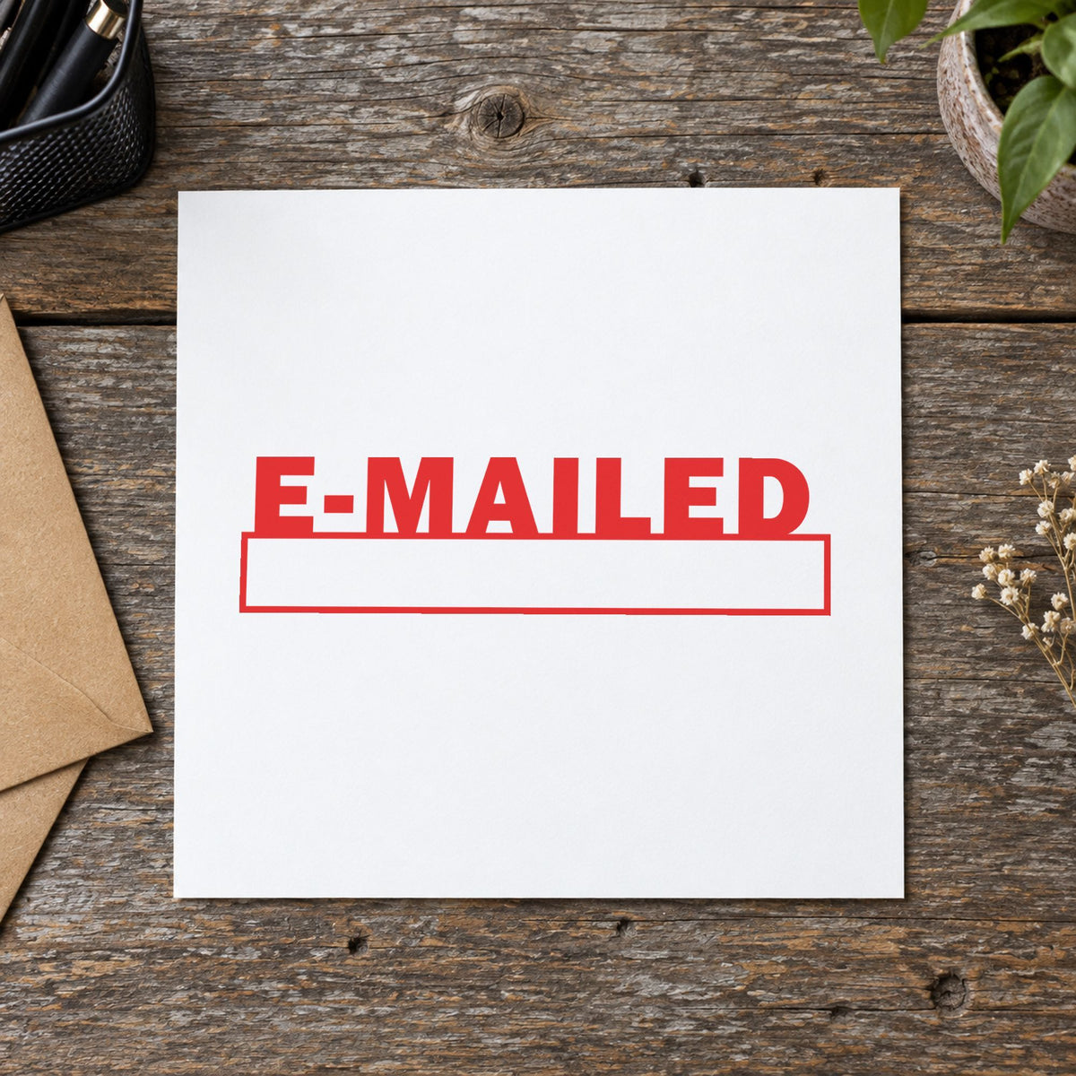 Close view of the "E-mailed" mark left by Xstamper No. 1650