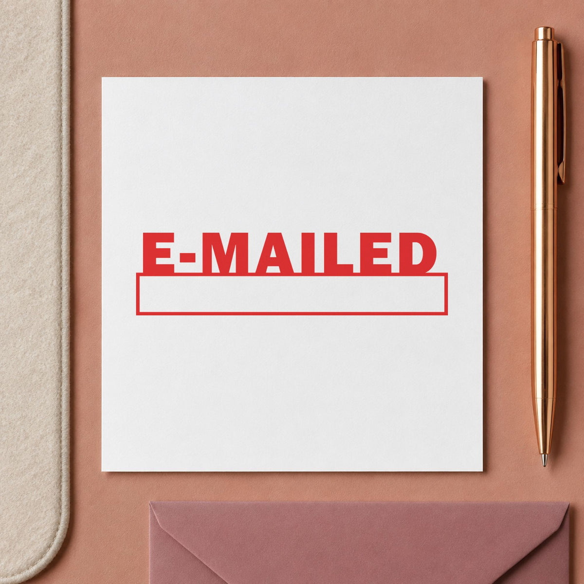 "E-mailed" Xstamper pre-inked stamp beside its rectangle imprint