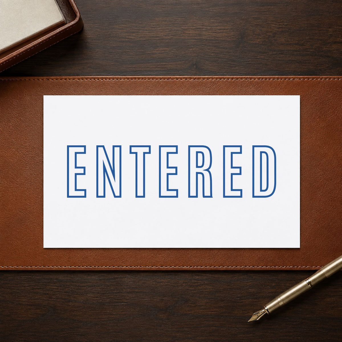 Pre-inked "Entered" stamp applied to a document, 1/2 x 1-5/8 in impression