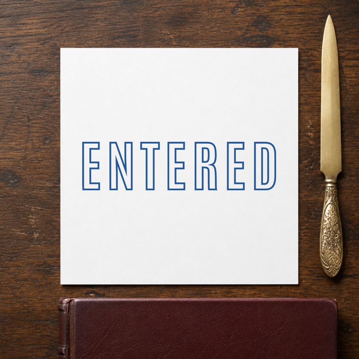 Close view of the "Entered" mark left by Xstamper No. 1021