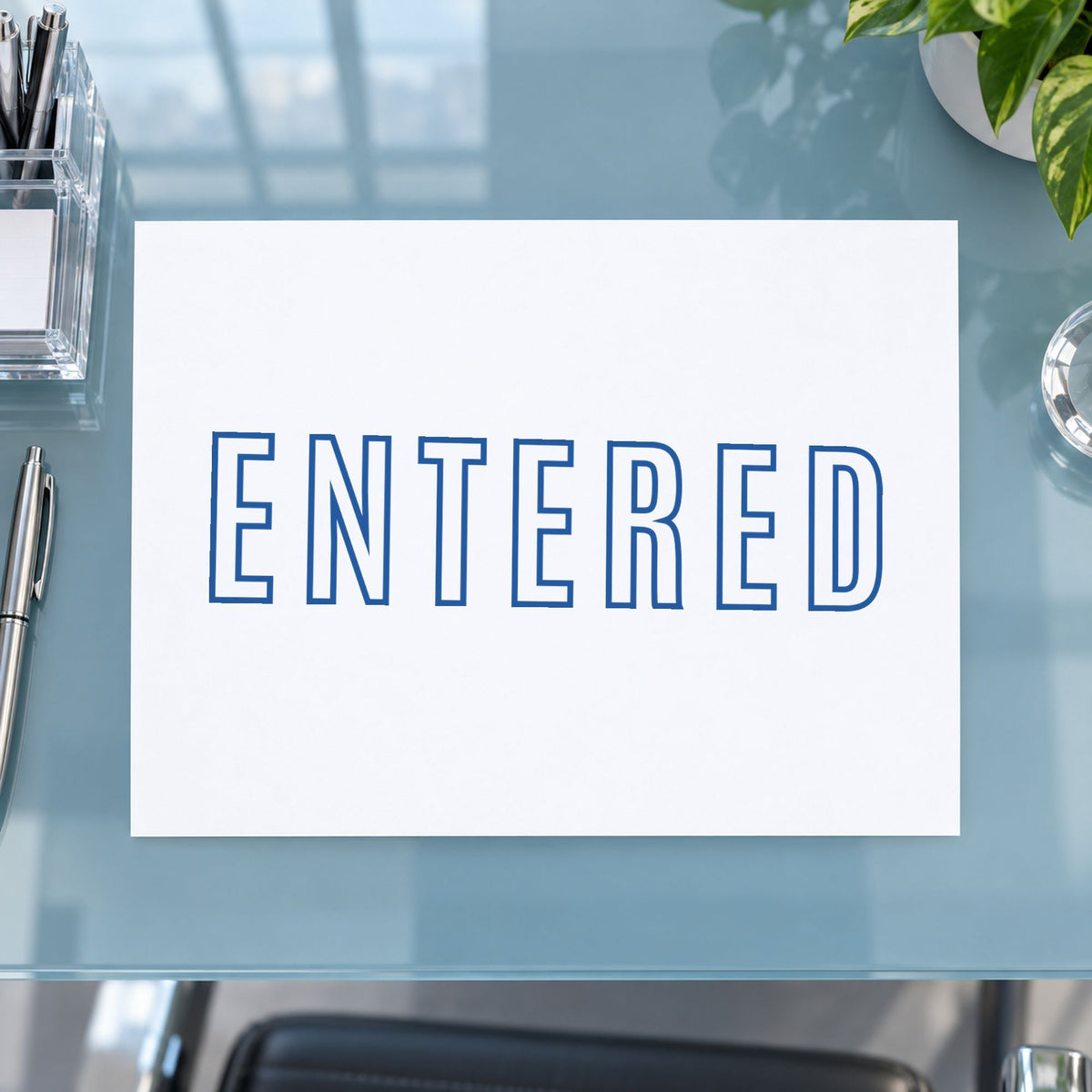 "Entered" imprint sized 1/2 x 1-5/8 in on a document page