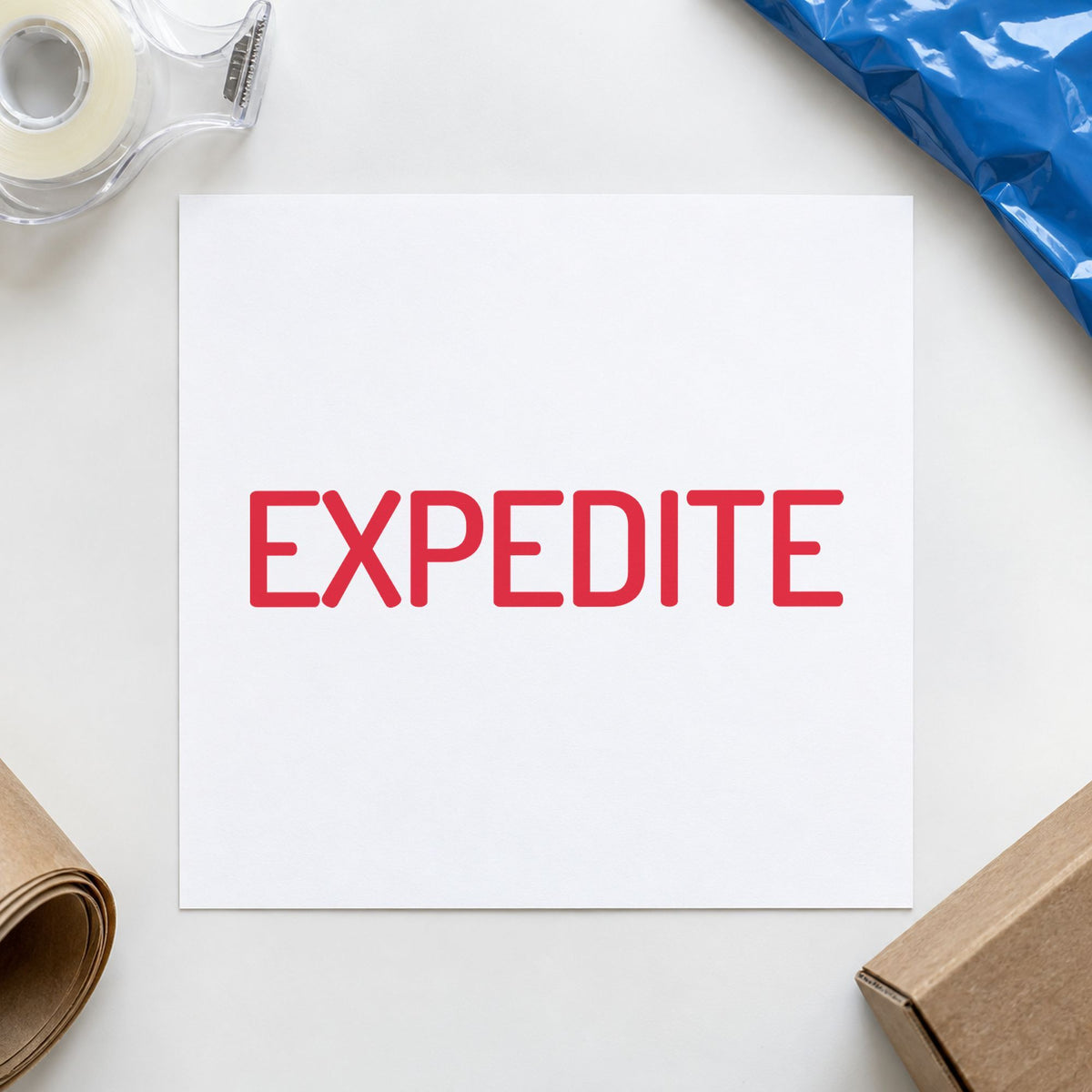 "Expedite" Xstamper stamp in use on paper, 1/2 x 1-5/8 in rectangle imprint