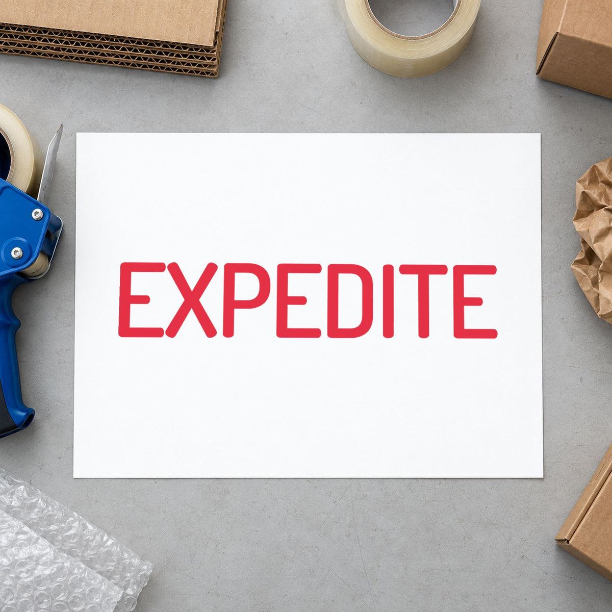 Pre-inked "Expedite" stamp marking paperwork in an office setting