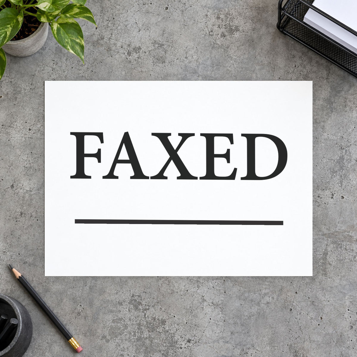 Close view of the "Faxed" mark left by Xstamper No. 1216