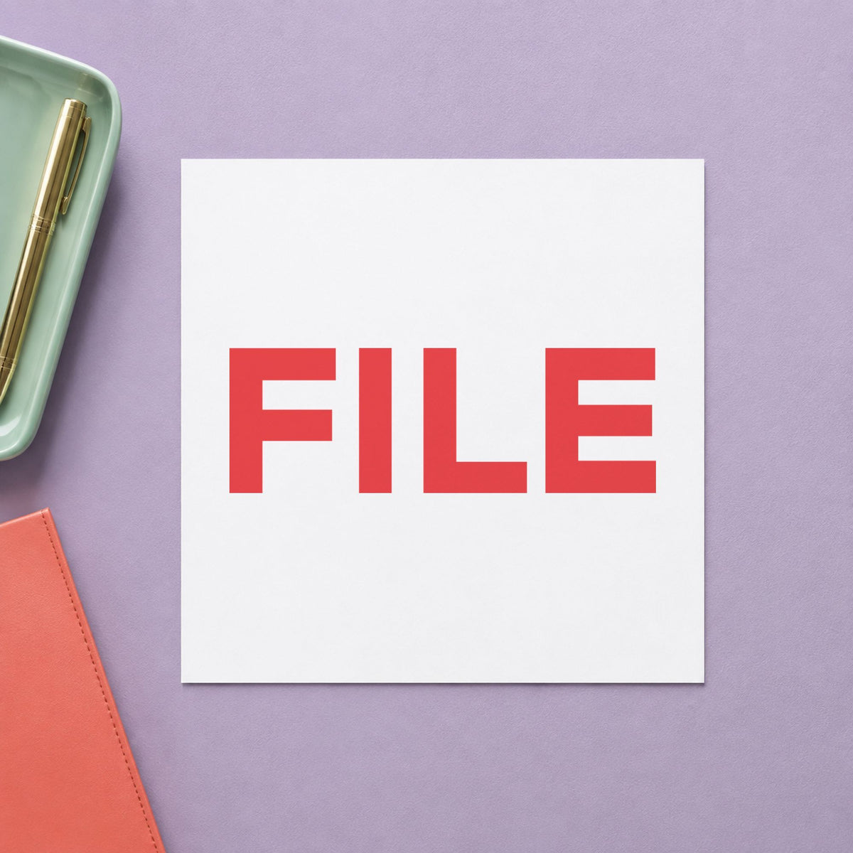 "File" stamp pressed on paper, no separate ink pad needed