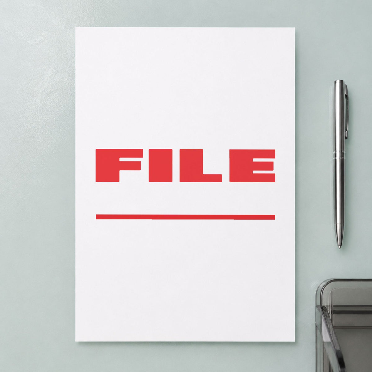 Pre-inked "File" stamp applied to a document, Approximately 1/2 in tall x 1-5/8 in wide impression