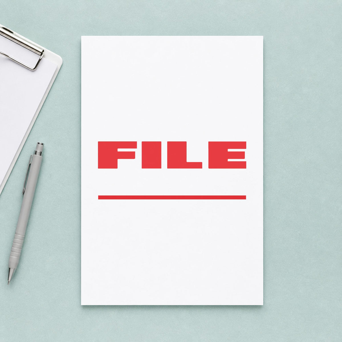 "File" stamp pressed on paper, no separate ink pad needed